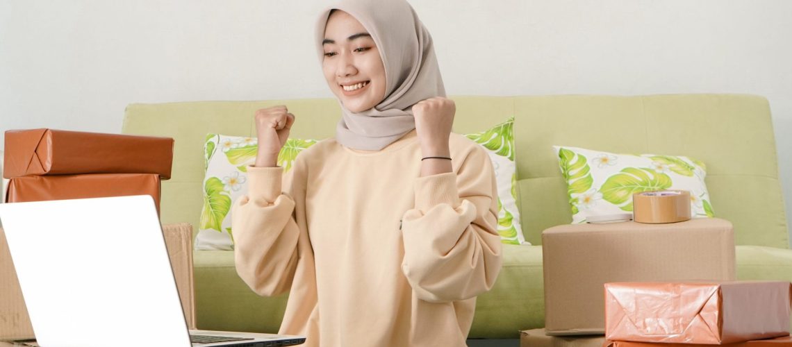 beautiful businesswoman feeling successful working in the room